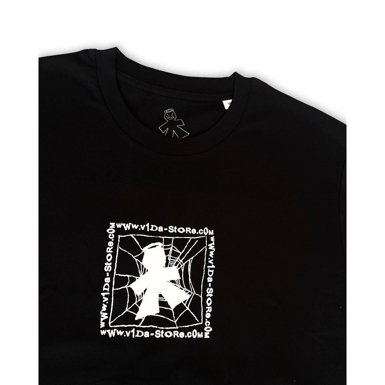 The V1da Web T-shirt is a black 100% cotton BMX tee with a white screenprint of a figure in front of a spider web and "www.v1da-store.com" repeated around the design.