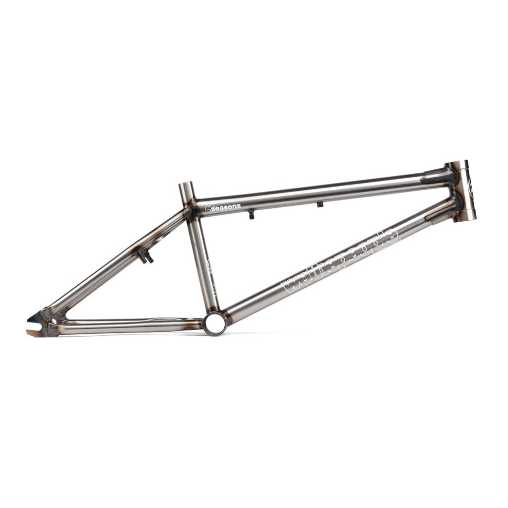 Side view of the metallic Wethepeople 4 Seasons BMX frame featuring "WeThePeople" text on the side, showcasing its sleek design. This limited-edition reissue embodies classic craftsmanship.