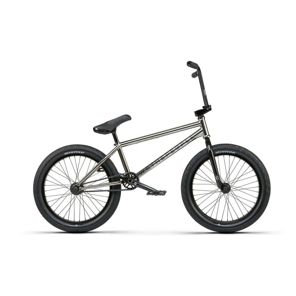 The Wethepeople Envy 20 Inch Bike features a metallic frame with black handlebars, seat, and wheels. Its modern design stands out against a white background, showcasing its advanced style.