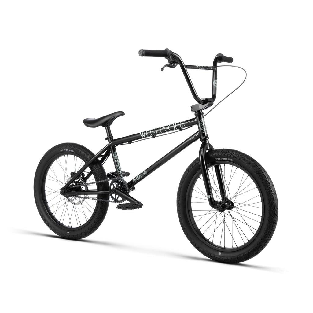 The Wethepeople Havoc 20 Inch Bike features a black chromo frame, thick tires, padded seat, and high handlebars, displayed on a white background.