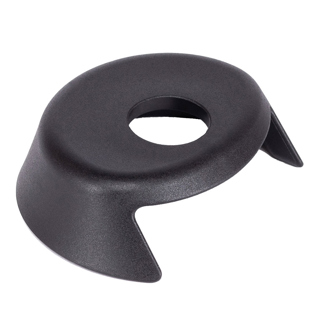 The WETHEPEOPLE Helix/Hybrid Rear Hub Driverguard is a black plastic ring with a central hole and side notch, perfect as a freecoaster hub guard for smooth grinding, especially designed for setups like the WTP Helix hub.