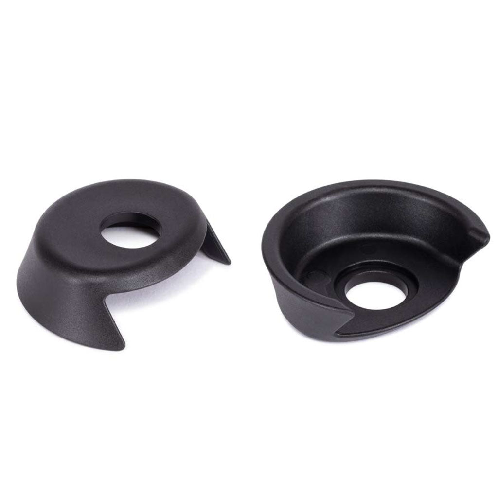 Two black, round WETHEPEOPLE Helix/Hybrid Rear Hub Driverguards with central holes and raised edges for smooth grinding are placed side by side on a white background.