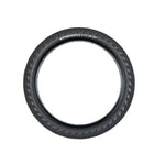 A single black Wethepeople Overbite Tyre (20x2.35) with micro knurled tread and "WETHEPEOPLE BIKE CO" text on the side, displayed on a white background. This all-rounder tire features a durable sticky compound for enhanced performance.