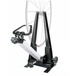 The Wheel Truing Stand (16-29 Inch) includes a mounted wheel, adjustable knobs, and a sturdy metal frame for precision truing across various rim widths.
