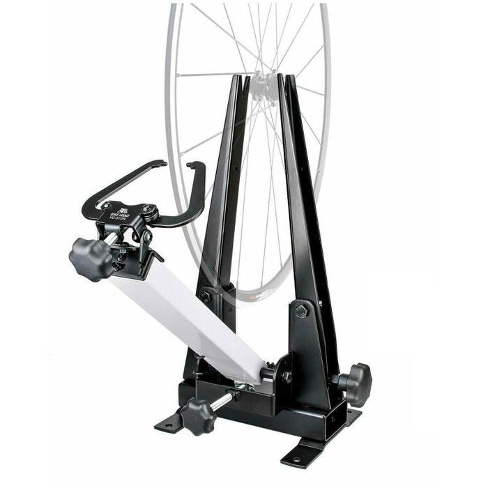 The Wheel Truing Stand (16-29 Inch) includes a mounted wheel, adjustable knobs, and a sturdy metal frame for precision truing across various rim widths.