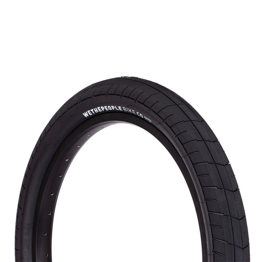 A Wethepeople Activate Tyre (60 PSI) with a textured sidewall for enhanced grip, set against a clean white background.