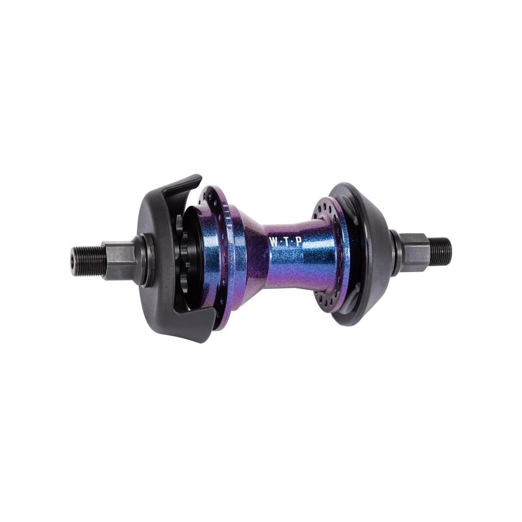 Close-up of the Wethepeople Hybrid Hub, showcasing a colorful cassette hub with black components and "W-T-P" printed on it, featuring a patented Magnetic Pawl Retention System.