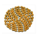 The YBN Freestyle chain 1/2-1/8, featuring a coiled design in orange and silver with nickel inner plates, is displayed from above, showcasing the distinct craftsmanship of YBN Chains.